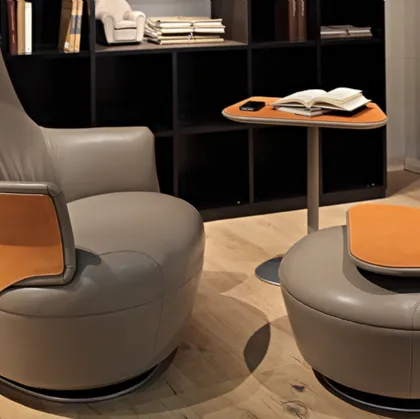 Pouf Assaya in pelle  con base in metallo di Poltrona Frau