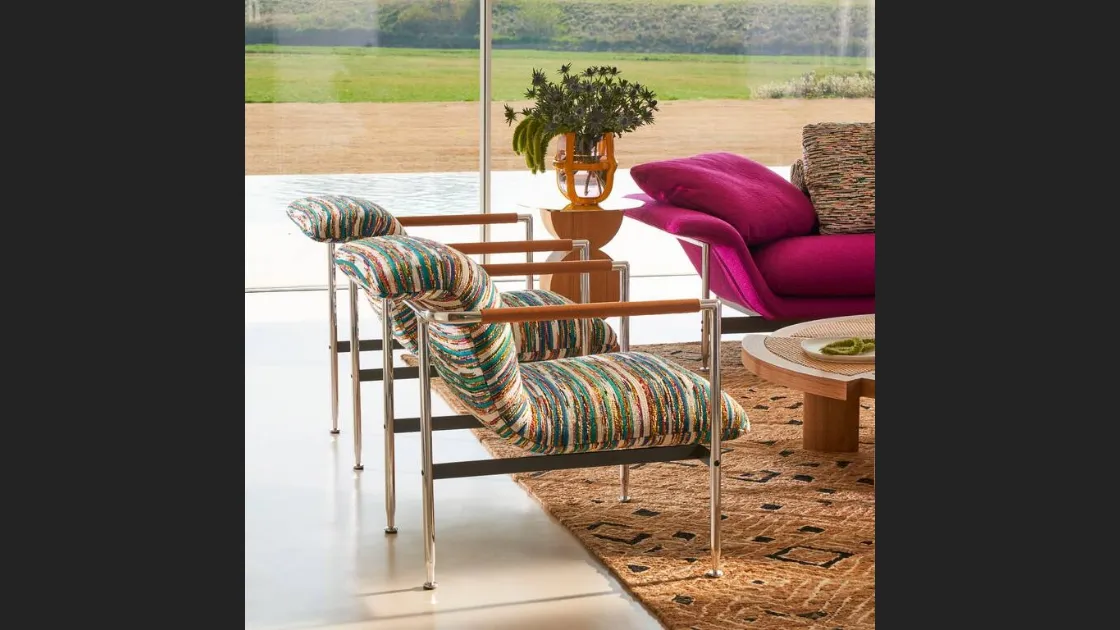 Poltroncina di design in tessuto Esosoft di Cassina